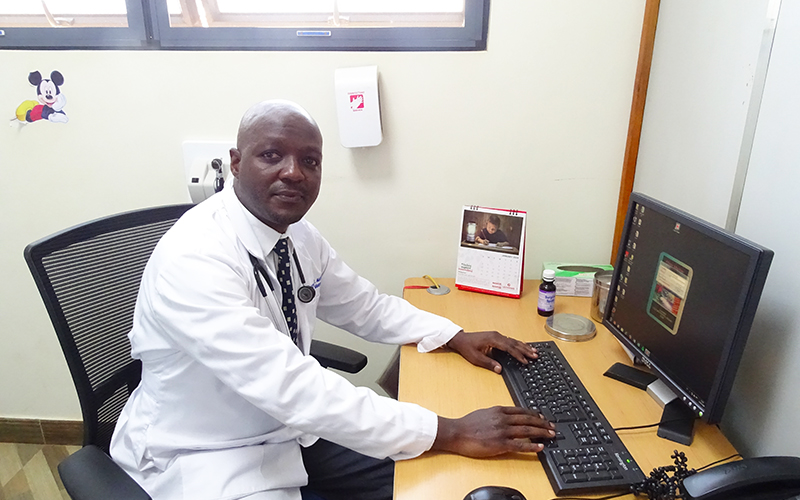 A Doctors Hospital Sseguku clinician in the paediatric consultation room